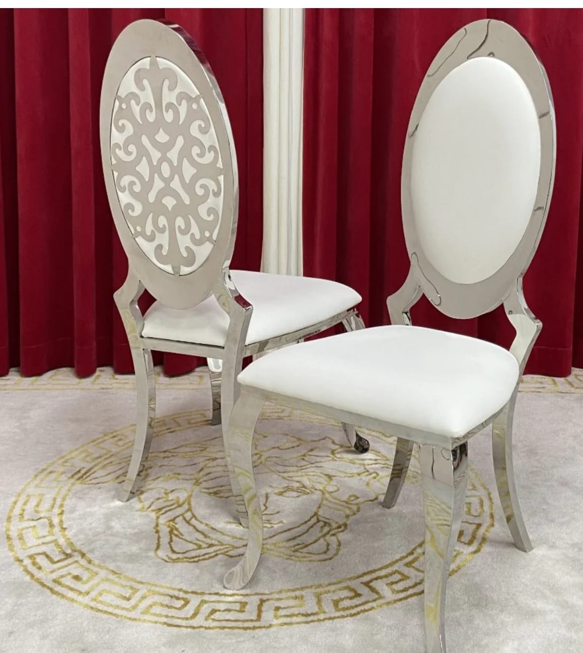 Duchess Silver Oval chair pair with chrome silver frame, plain and filigree oval back variants, white cushions