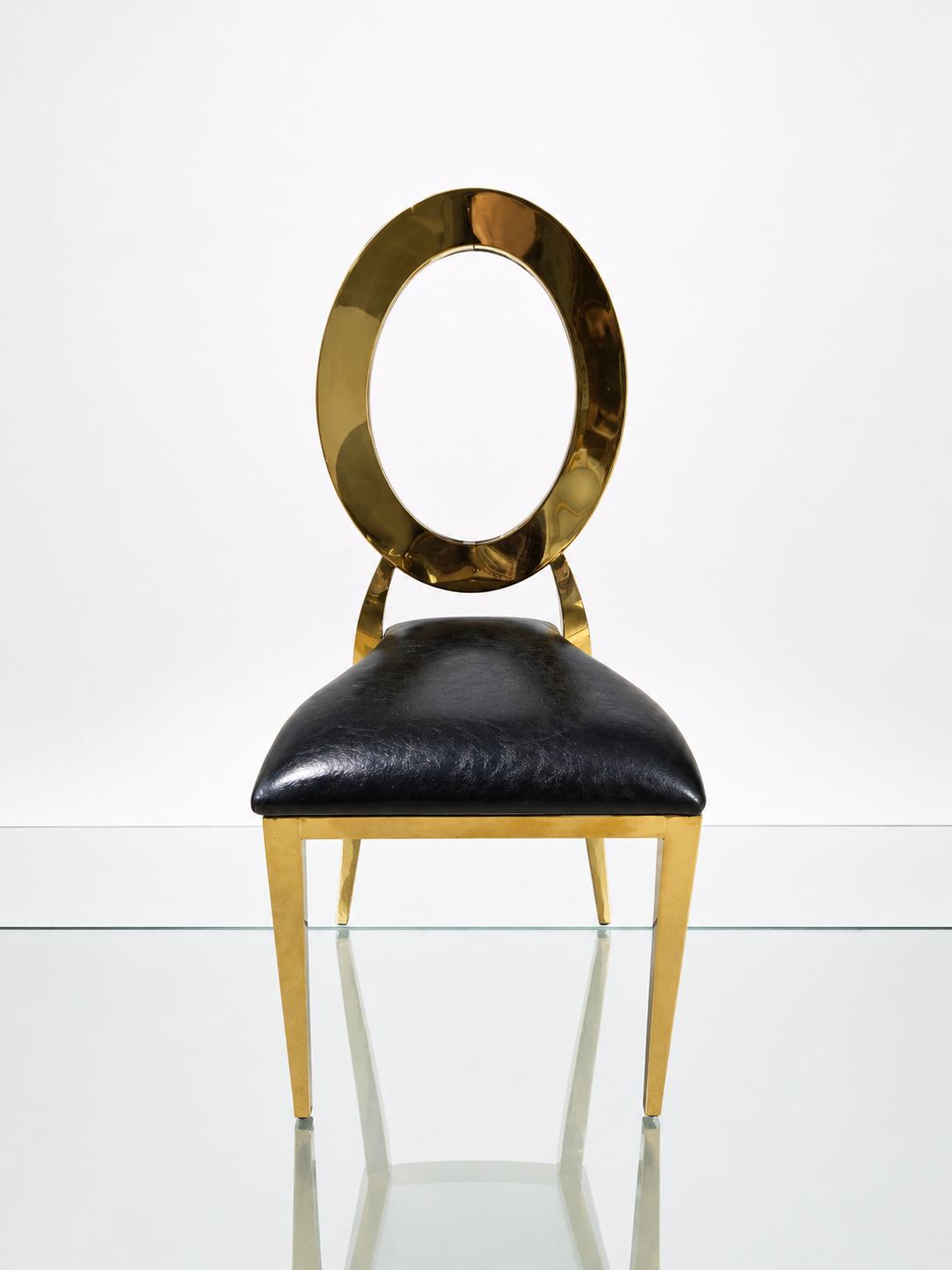 Classic Gold Circle chair with gold ring back and black leather seat