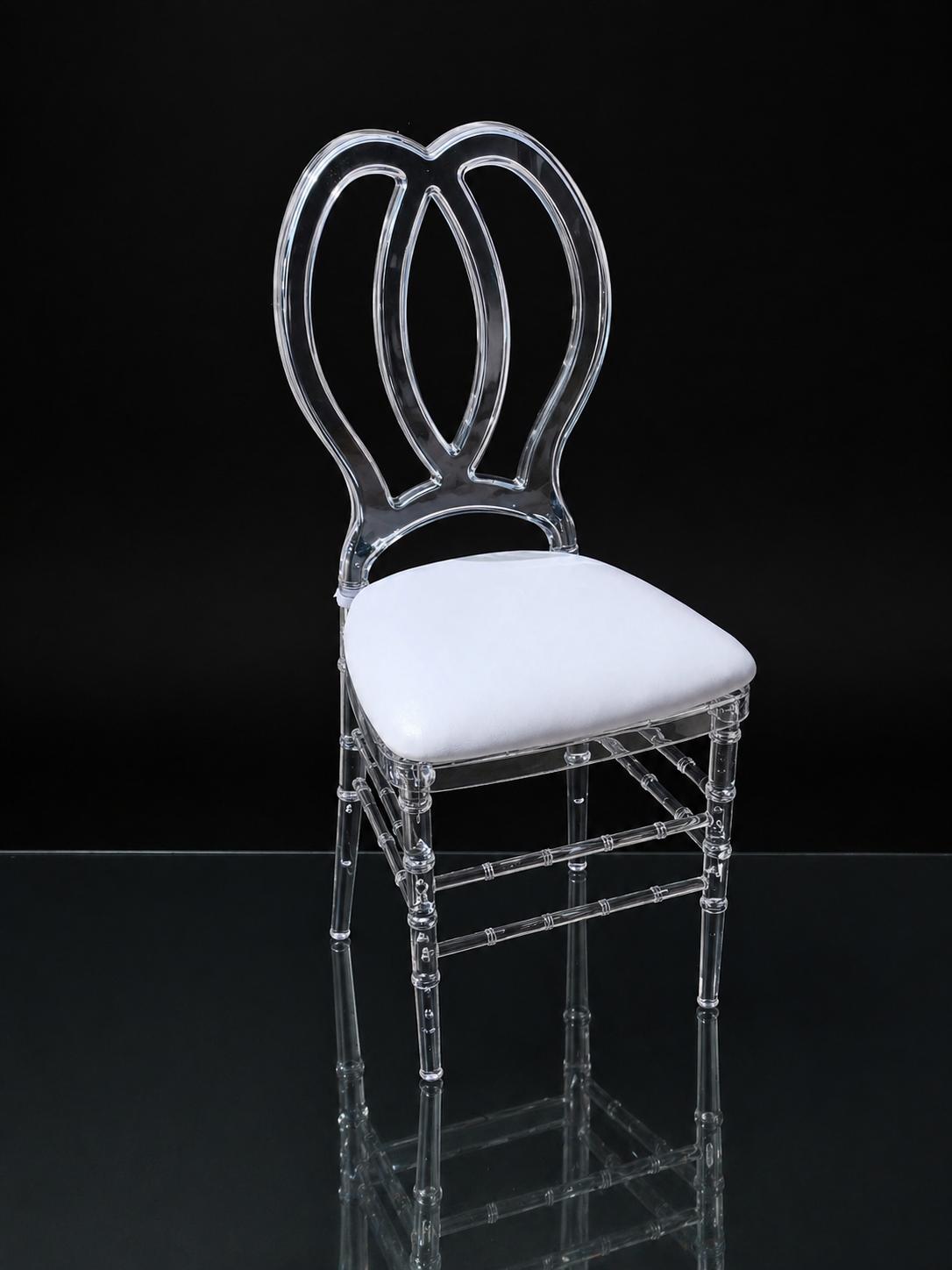 Ghost Phoenix clear acrylic chair with Phoenix-style oval back and white cushion