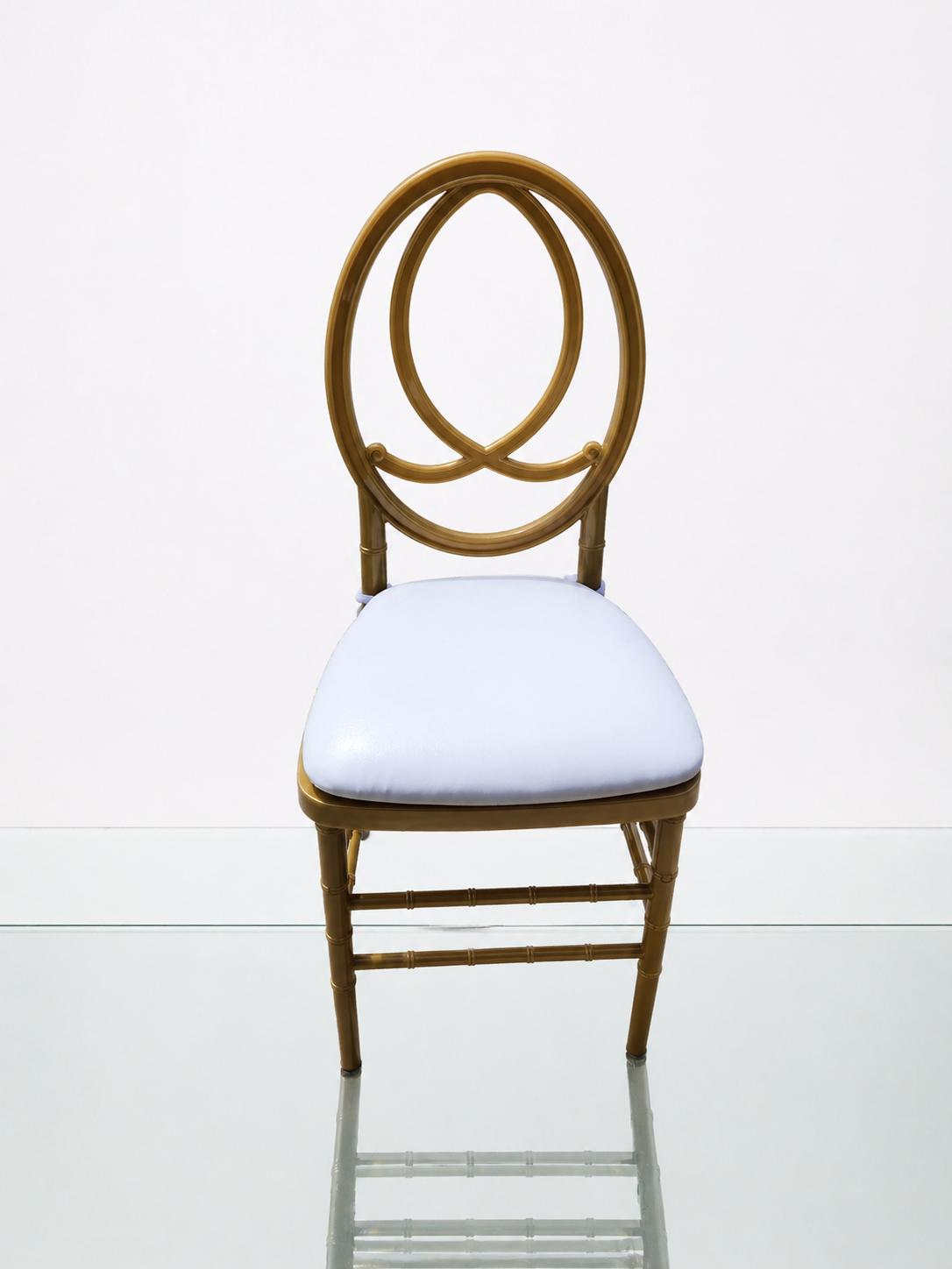 Gold Phoenix event chair with gold frame, ornate Phoenix-style oval back, white cushion, bamboo-style legs